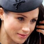 Meghan Markle's missing $200,000 diamond engagement ring has sparked speculation among fans after she appeared without it in a radiant birthday lunch photo with friends.