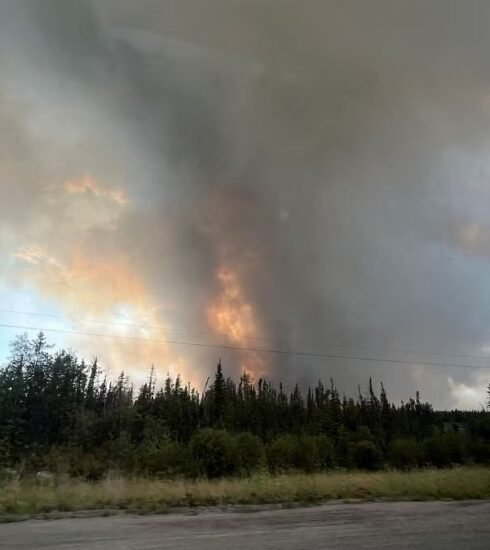 Out-of-control wildfires in Canada's Northwest Territories have prompted the evacuation of around 20,000 residents from Yellowknife, the capital city. The Behchoko/Yellowknife wildfire, burning less than 10 miles outside the city, has triggered a state of emergency. Over 230 active fires pose threats to various areas. Stay informed about the unfolding crisis.