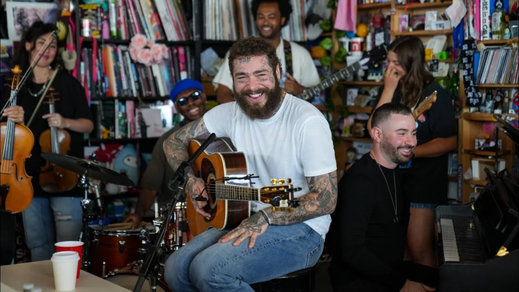 Post Malone's remarkable Tiny Desk Concert showcases his humility and talent, performing his chart-topping hits in an intimate setting. Experience the magic of one of the world's biggest stars.
