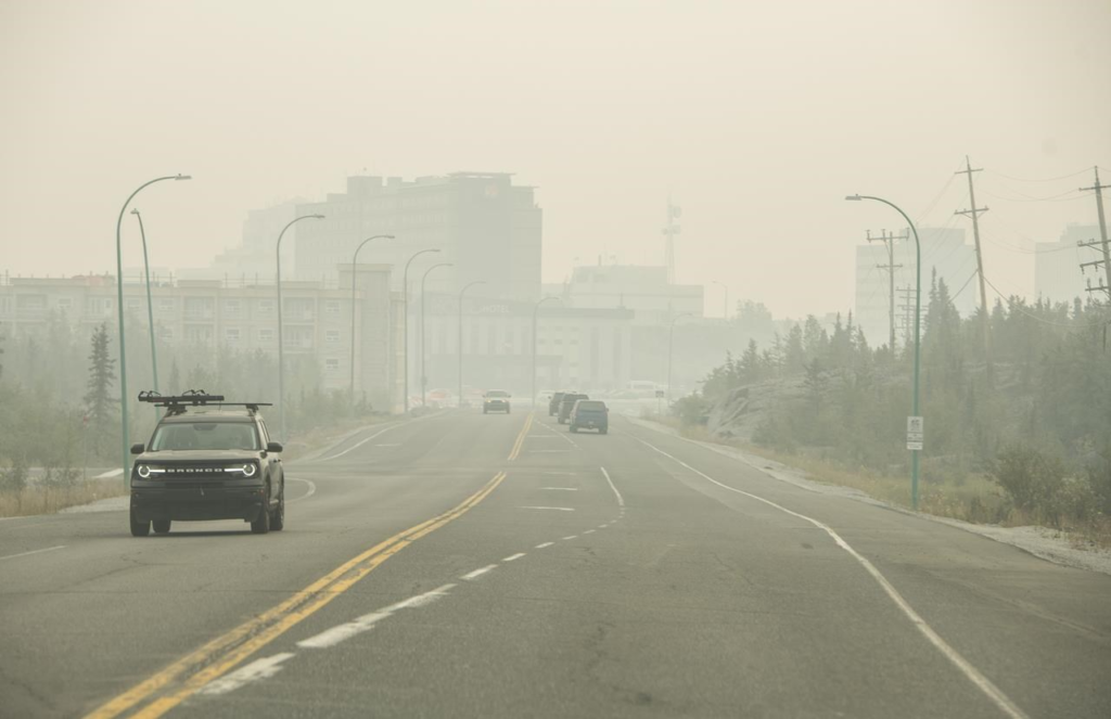 Out-of-control wildfires in Canada's Northwest Territories have prompted the evacuation of around 20,000 residents from Yellowknife, the capital city. The Behchoko/Yellowknife wildfire, burning less than 10 miles outside the city, has triggered a state of emergency. Over 230 active fires pose threats to various areas. Stay informed about the unfolding crisis.
