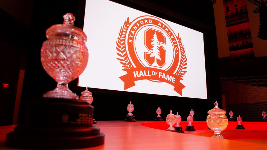 Stanford University Athletics proudly announces the induction of the 2023 Hall of Fame Class, comprising 10 exceptional former student-athletes. From Andrew Luck's football prowess to Kori Carter's track and field triumphs, join us on September 29 to honor their remarkable contributions.