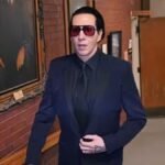 "Controversial musician Marilyn Manson fined and sentenced to community service for spitting and blowing nose on a concert camerawoman in New Hampshire."