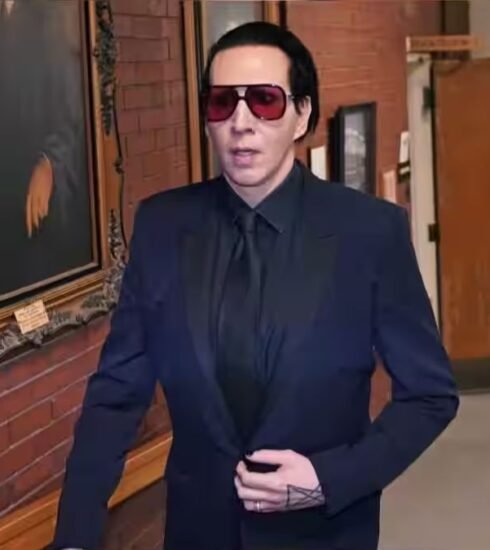 "Controversial musician Marilyn Manson fined and sentenced to community service for spitting and blowing nose on a concert camerawoman in New Hampshire."