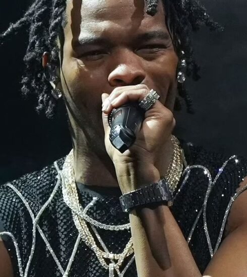 "A shooting incident occurred during Lil Baby's concert in Memphis, leaving a man seriously injured. The unidentified shooter is still on the loose. Stay tuned for updates on this developing story."