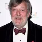 "Actor Stephen Fry shares his experience as AI clones his voice from Harry Potter audiobooks, sparking concerns in Hollywood's labor dispute."