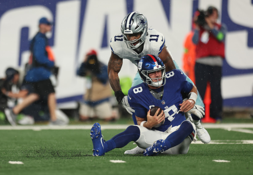 "The Dallas Cowboys dominated the New York Giants in a stunning 40-0 victory on Sunday Night Football, showcasing their prowess in NFL Week 1."

