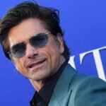 Exclusive interview with John Stamos as he discusses his childhood trauma and advocacy for survivors.