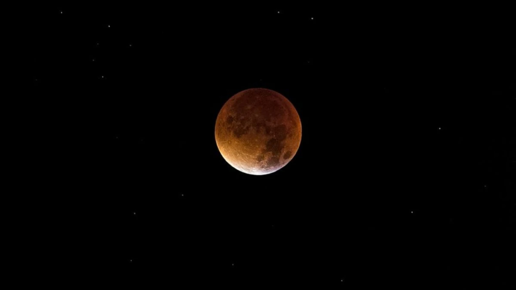  "A breathtaking lunar eclipse is on the horizon! This weekend, stargazers on four continents will witness the Moon gracefully glide through Earth's shadow. Learn more about this celestial event and essential viewing tips."