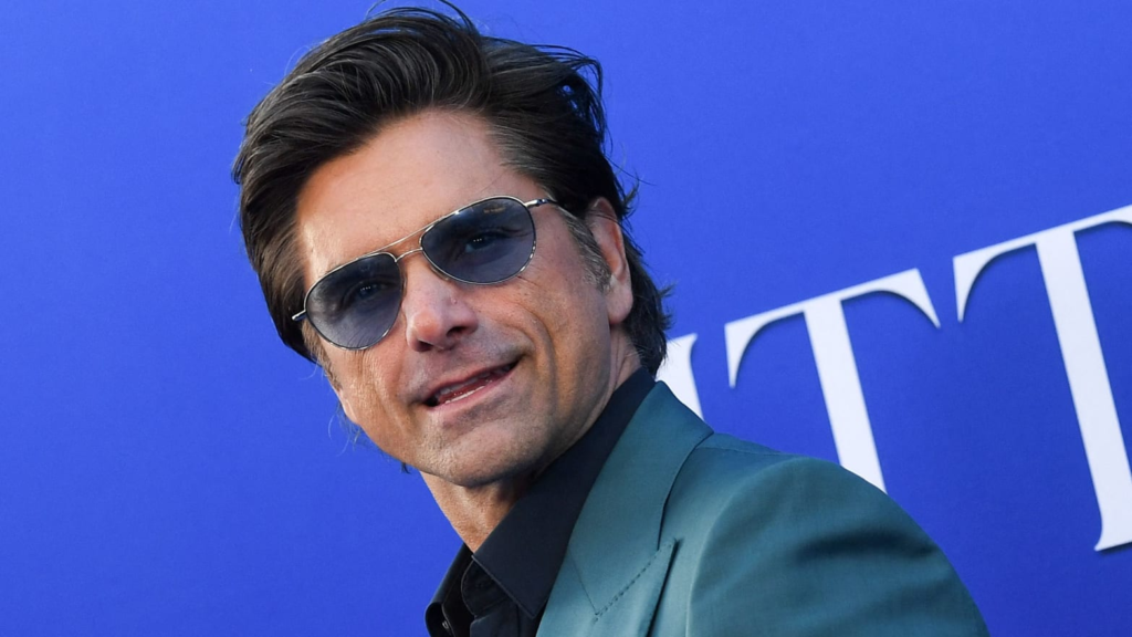 Exclusive interview with John Stamos as he discusses his childhood trauma and advocacy for survivors.
