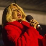 "Delve into Darlene Love's iconic career, from Phil Spector's studio to Christmas fame. Discover her favorite vocalists and catch her upcoming NYC performances."
