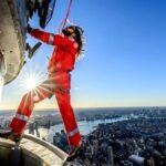 Jared Leto scales the heights of the Empire State Building to promote Thirty Seconds to Mars' upcoming tour, showcasing his daring spirit and love for New York City.