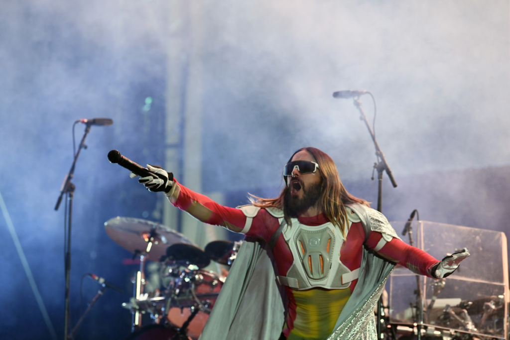 Jared Leto scales the heights of the Empire State Building to promote Thirty Seconds to Mars' upcoming tour, showcasing his daring spirit and love for New York City.
