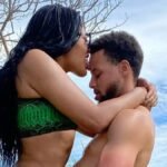 "Golden State Warriors' Ayesha Curry stuns in a black bikini during her Jamaican vacation, sparking both admiration and controversy on social media."