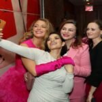 "Experience the heartwarming reunion of 'Sisterhood of the Traveling Pants' stars at a Barbie-themed event in New York City, capturing the enduring bond nearly two decades later."