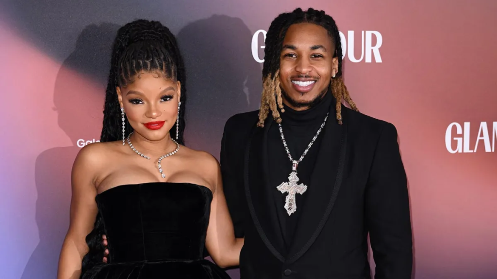 "Unwrapping luxury: Halle Bailey's boyfriend DDG splurges $500,000 on Christmas gifts, featuring a Hermès Birkin bag, a Tiffany & Co. bracelet, and more. The festive celebration captured on Snapchat unveils their lavish holiday morning."
