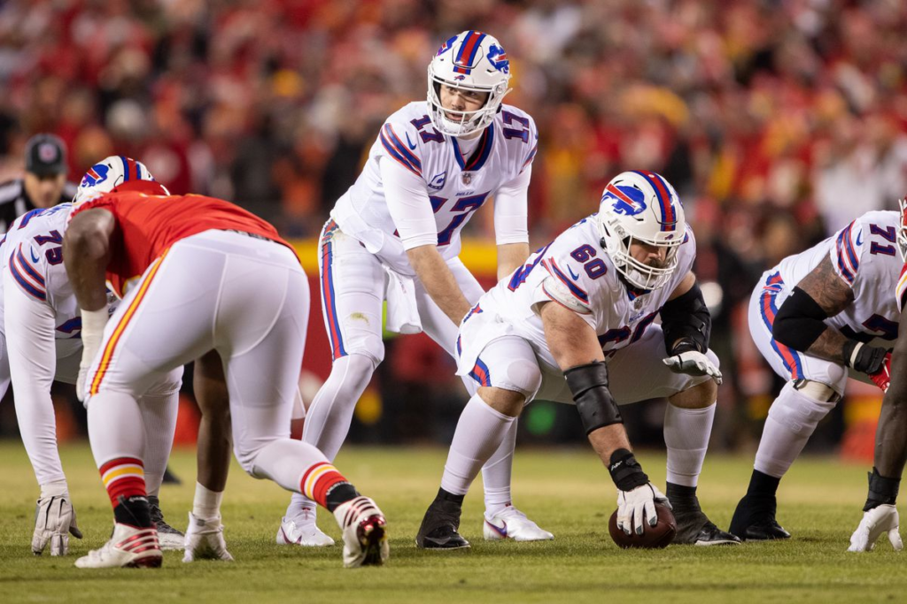 "The Buffalo Bills secure a crucial 20-17 victory against the Chiefs, overcoming a controversial call and keeping their playoff dreams alive in a nail-biting NFL showdown."
