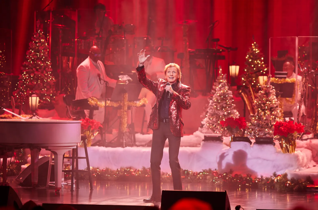 "Barry Manilow shares the magic of his 'A Very Barry Christmas' TV special and a changing perspective on being a 'Fanilow.' Dive into the holiday spirit and timeless melodies."

