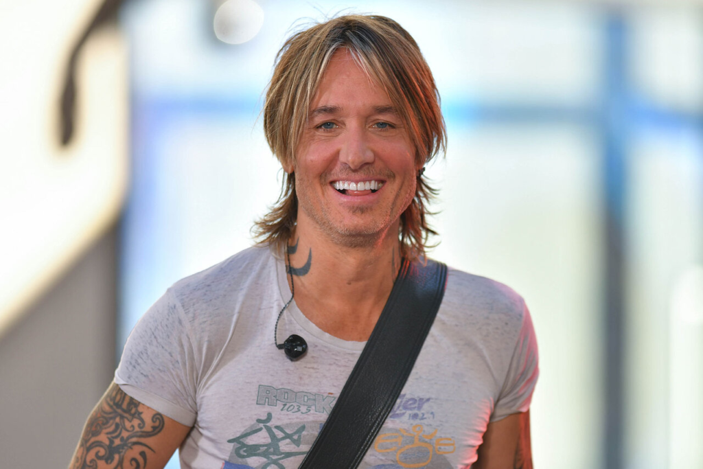 "In a spectacular finale, Keith Urban graces The Voice Season 24 stage with a mesmerizing performance of his 2016 hit, 'Blue Ain't Your Color.' Relive the magic and fan reactions as the country star brings nostalgia to the grand finale."
