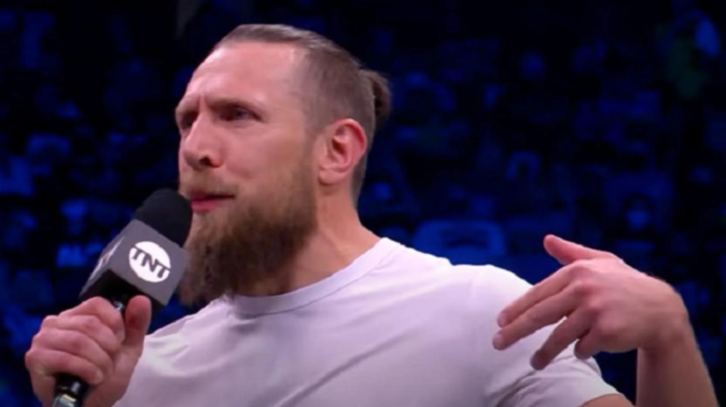 "Former WWE Champion Bryan Danielson raises the stakes ahead of Wrestle Kingdom 18 by flipping off opponent Kazuchika Okada. The intense rivalry takes a personal turn, setting the stage for a high-stakes showdown."
