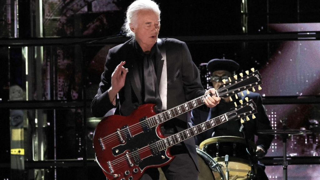 "Led Zeppelin legend Jimmy Page pays heartfelt homage to Link Wray, performing 'Rumble' at the Rock and Roll Hall of Fame. Watch the surprise tribute on Louder."
