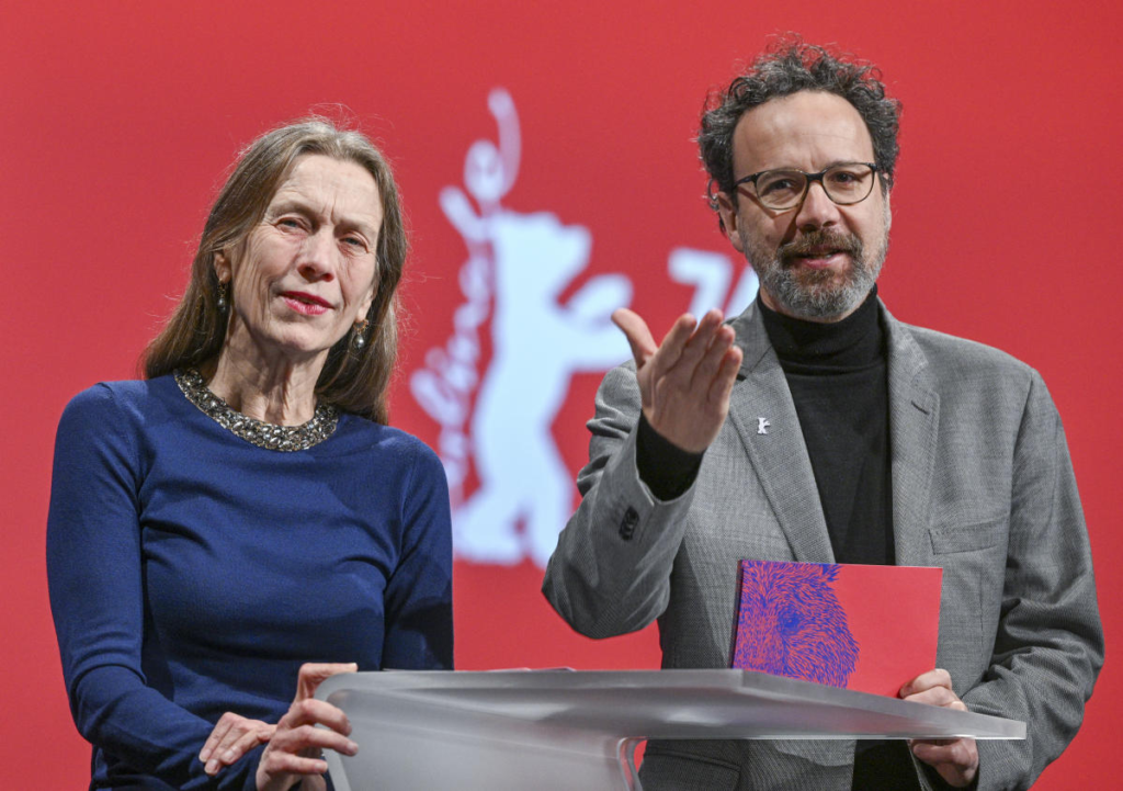 The Berlinale, in its 74th edition, stands firm against hate speech, expressing solidarity with the victims of the Middle East crisis. Festival co-heads emphasize the role of film and open discussions in fostering empathy and understanding, addressing concerns over the spread of anti-Semitism and anti-Muslim resentment in Germany and worldwide. Initiatives for open dialogue, including the "Tiny House" space, are announced to encourage peaceful conversations amidst the ongoing Israel-Hamas conflict.
