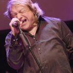 Lou Gramm, the original FOREIGNER frontman, extends heartfelt thanks for the band's Rock And Roll Hall Of Fame nomination. In a one-minute video, Gramm expresses gratitude, acknowledges Mick Jones' courage in facing Parkinson's, and appreciates star-studded industry support. Discover the details of this exciting nomination journey.