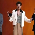 "Harry Styles clinches the Grammy Award for Album of the Year with 'Harry's House,' a validation of his solo career and creative authenticity."