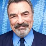 "In an exclusive interview, Tom Selleck reveals his optimism for 'Blue Bloods' beyond Season 14, discussing the show's legacy and his reflections on 'Magnum, P.I.'"