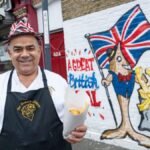 London's renowned Golden Chippy is ordered to take down its Union flag mural, sparking debates over patriotism and cultural representation.