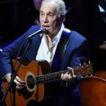 Renowned musician Paul Simon shares his journey from hearing loss to musical ease, expressing joy in singing and playing instruments once again.
