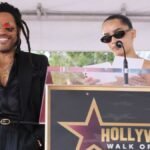 Join the heartwarming moment as Zoë Kravitz brings laughter to her father Lenny Kravitz's Walk of Fame induction, playfully teasing his iconic fashion choices.