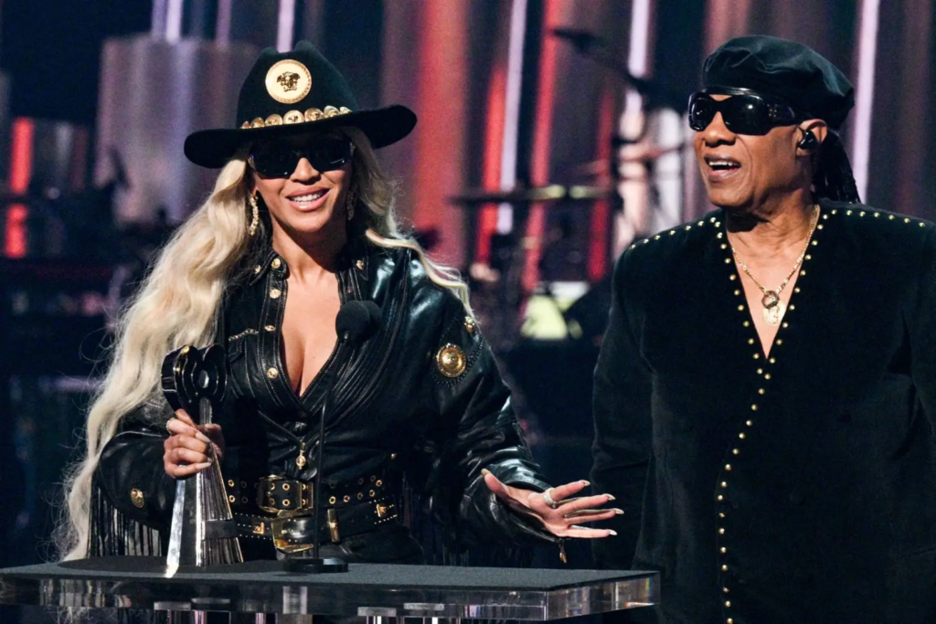 Beyoncé receives the Innovator Award and pays homage to icons who defied labels, highlighting the importance of musical pioneers in her acceptance speech.