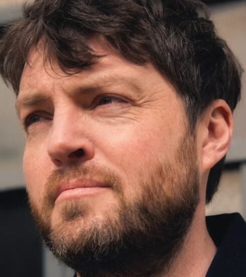 In an exclusive interview, Tom Burke delves into his character in Furiosa and shares his thoughts on collaborating with acclaimed author J.K. Rowling.