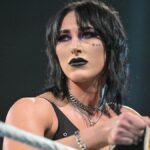 In an exclusive interview, a WWE star sheds light on the reasons behind being kept apart from Rhea Ripley before their much-anticipated Australia tour, offering insights into backstage dynamics and preparations for the event.
