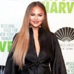Chrissy Teigen opens up about her body's response to spicy food after welcoming daughter Esti, shedding light on postpartum changes and challenges.