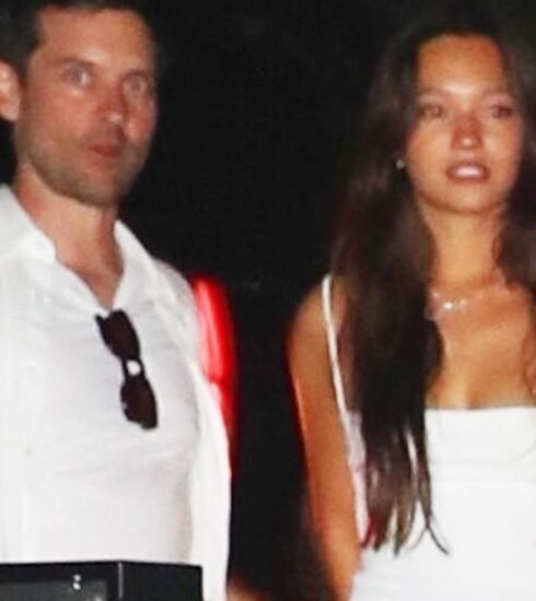 Actor Tobey Maguire and actress Lily Chee were seen together at a star-studded Fourth of July party, igniting speculation about their relationship status.