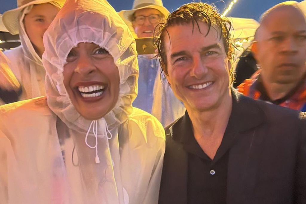 Hoda Kotb made headlines at the Olympics with her first-time meeting with Tom Cruise. Despite the rainy weather and a wet poncho, Kotb's huge grin highlighted the special moment. Discover the details of this star-studded encounter and how it added charm to the event.






