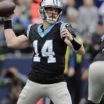 In a decisive performance, Andy Dalton threw three touchdown passes, guiding the Carolina Panthers to their first win of the season following a challenging week.