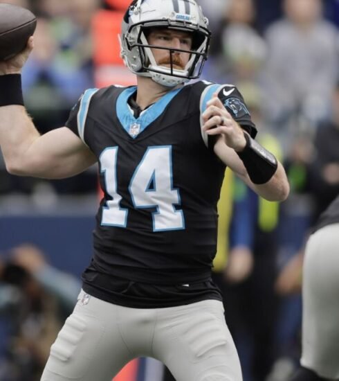 In a decisive performance, Andy Dalton threw three touchdown passes, guiding the Carolina Panthers to their first win of the season following a challenging week.