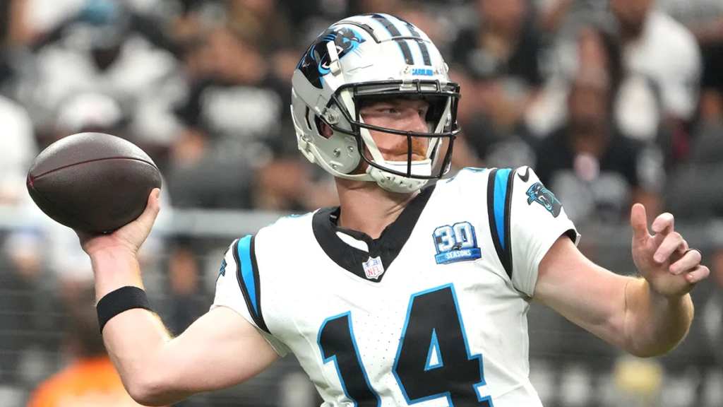 In a decisive performance, Andy Dalton threw three touchdown passes, guiding the Carolina Panthers to their first win of the season following a challenging week.






