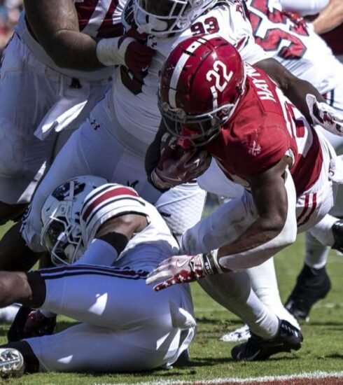 In a nail-biting finish, the BYU Cougars thwarted the Oklahoma State Cowboys' upset attempt with a decisive late touchdown, securing a hard-fought victory in college football.