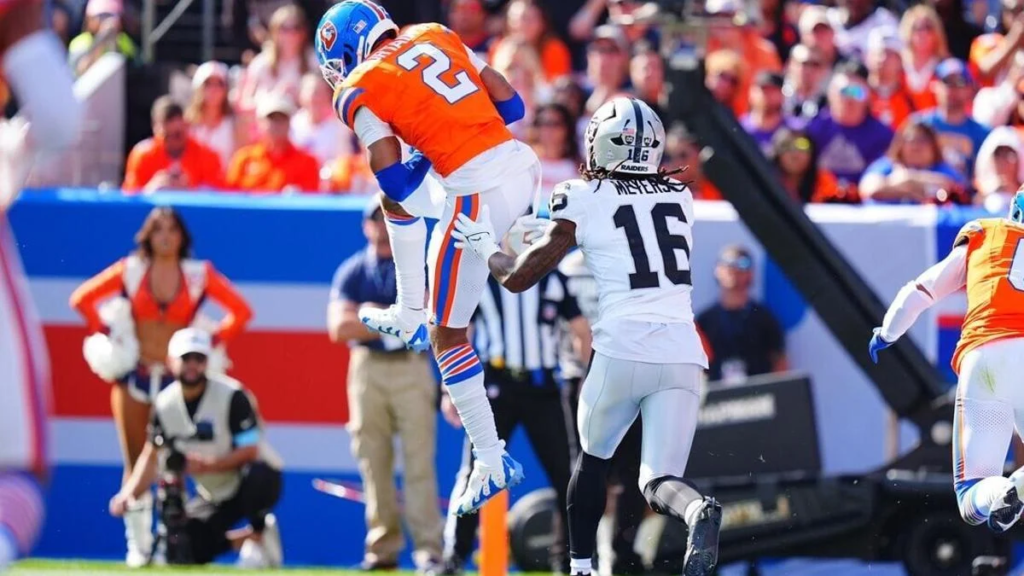 In a stunning display of athleticism, Patrick Surtain II intercepted Gardner Minshew and returned the ball 100 yards for a touchdown, solidifying his impact on the game and showcasing the defensive strength of the Denver Broncos.






