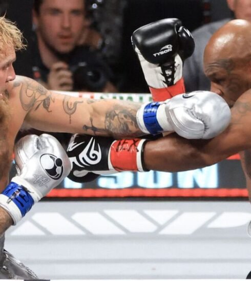 In a highly anticipated boxing clash, Jake Paul defeats Mike Tyson by decision. The match, filled with intensity, ended with Paul’s hand raised in victory. Find out more about the thrilling outcome and what this means for both fighters.