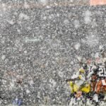 The Steelers and Browns faced off in a winter wonderland as a Cleveland blizzard transformed the game into a snowy spectacle. Snow piled up on the field, creating a dramatic backdrop for an intense NFL rivalry.