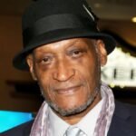 "Tony Todd, the legendary actor celebrated for his chilling performance in 'Candyman' and notable roles in films like ‘Final Destination’ and ‘Platoon,’ has passed away at the age of 69. Todd's career spanned over three decades with hundreds of film and television credits, leaving a lasting impact on Hollywood and horror cinema. Known for his distinct voice and imposing presence, Todd’s performances have inspired fans and filmmakers alike. His passing marks a profound loss for the entertainment world."