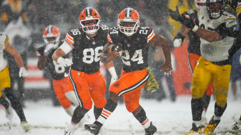 The Steelers and Browns faced off in a winter wonderland as a Cleveland blizzard transformed the game into a snowy spectacle. Snow piled up on the field, creating a dramatic backdrop for an intense NFL rivalry.






