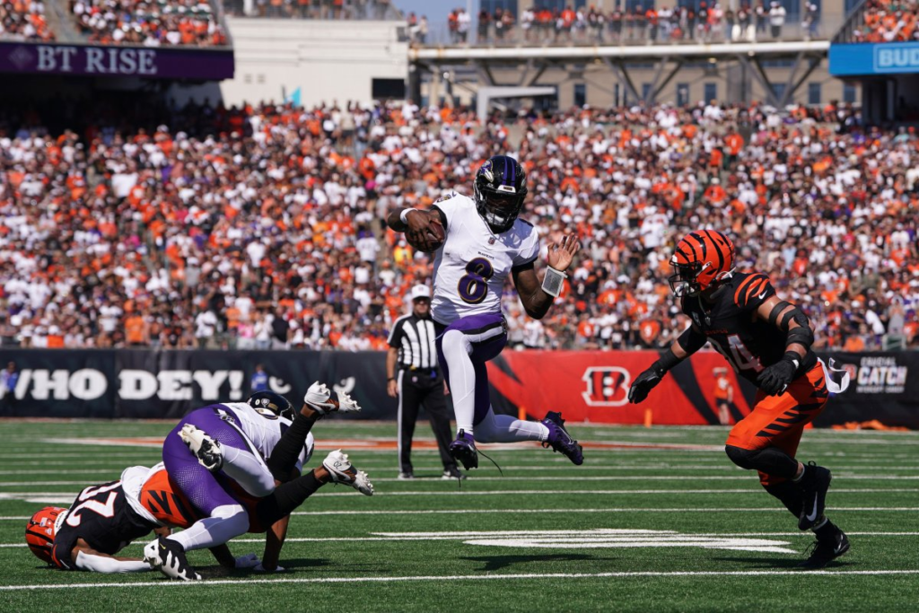 "In an electrifying AFC North showdown, Lamar Jackson led the Baltimore Ravens to a thrilling victory over the Cincinnati Bengals, solidifying their position in the division. The high-stakes game kept fans on the edge of their seats as Jackson’s dynamic play and the Ravens' strong defense ultimately secured the win. Here’s a full recap of the key moments that defined this nail-biter."






